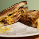 Illustration for article titled Snoop Dogg on cooking, the art of entertaining, and his OG fried bologna sandwichem/em